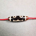 3 Eyed Dzi Bead - Tibetan dzi bead, front view
