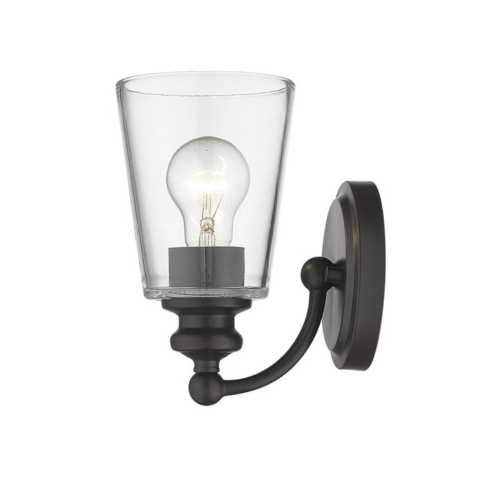 Side view of the lighted Antique Bronze One-Light Wall Sconce with clear glass shade and curved swing arm