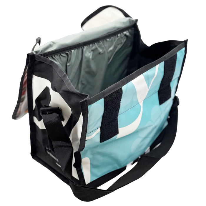 Multi-color bag with black straps on a white background