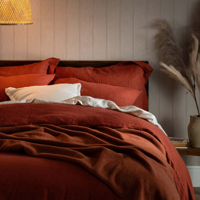 Burnt Orange French Linen Bed Sets - breathable, natural, styled in a bedroom | Soak and Sleep