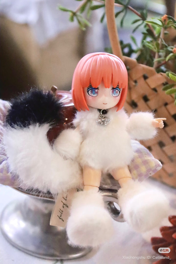 Cat Island-Black Cat Or Candy Cat Series figurine, pink bob haircut, in fluffy white outfit with tail, seated on decorative dish, preorder at Strangecat Toys.