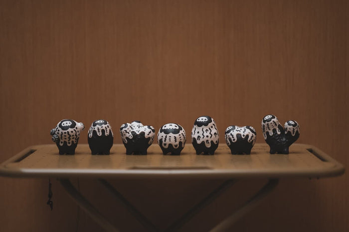 Copiapoa Mudball Blind Box Series by Robin Huang features black and white sheep figurines, showcasing 6 designs with a potential secret addition.
