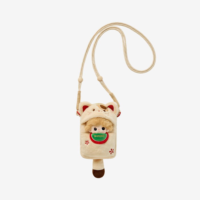 DIMOO Weaving Wonders Series mini bag, featuring a cartoon cat design with an embroidered face, adjustable strap, and doll's head peeking from the front pocket.