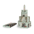 A vintage-style illustrated paper tower set with a matching box placed beside it on a plain white background. The tower is made of multiple printed paper panels with whimsical drawings, and the box shows a matching patterned cover.