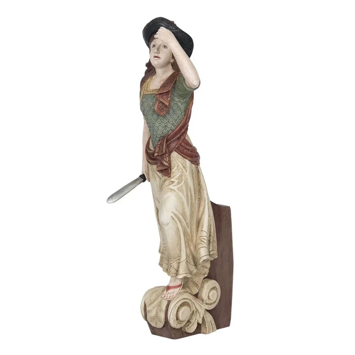 A resin figurine of Britannia, a historical figurehead often used on the bowsprit of sailing ships, depicting a woman in period clothing holding a sword.
