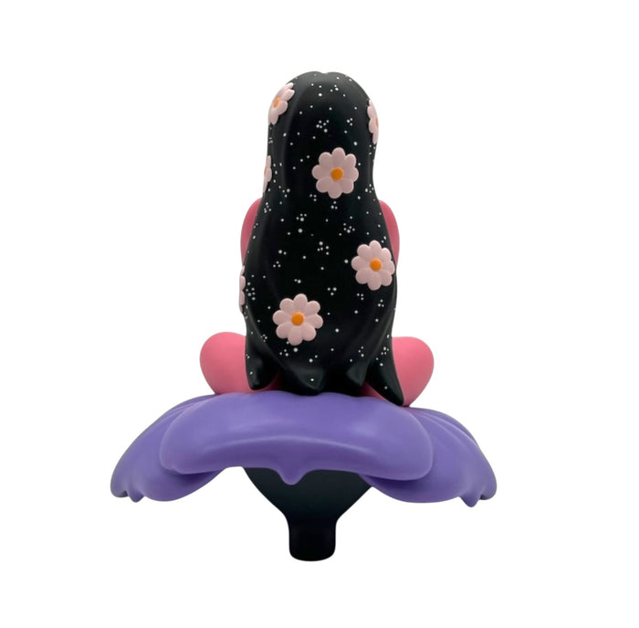 Flower Girl by Robin Eisenberg, a 6 vinyl figure of a girl sitting on a flower, limited to 100 pieces.