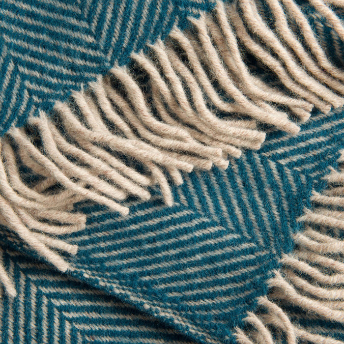 Herringbone Pure Wool Teal Throw - winter, styled in a bedroom | Soak and Sleep