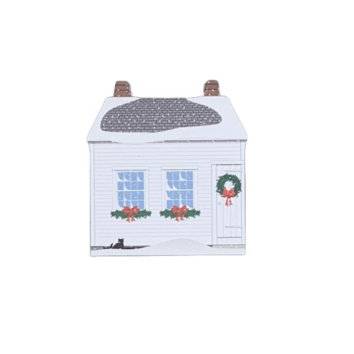 Decorative wood block of the Lye-Tapley Shoe Shop decorated for the holidays.