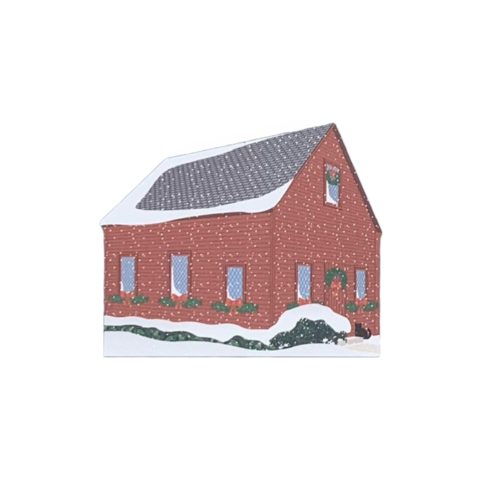 Decorative wood block of the Quaker Meeting House decorated for the holidays.