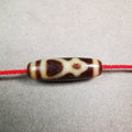 Kubera Dzi Bead - Tibetan dzi bead, front view