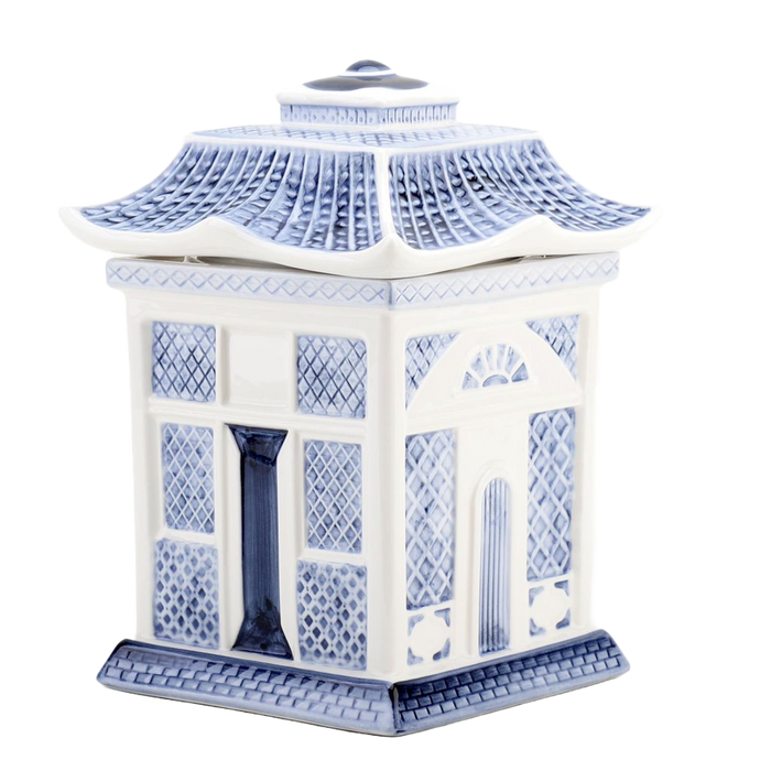 A blue and white porcelain lidded jar with a blue willow embossed design, resembling a traditional Asian pagoda style cookie jar.