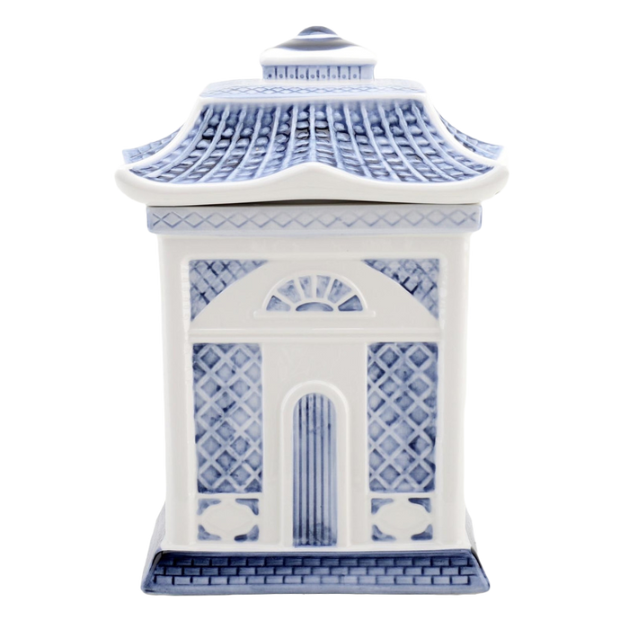 A blue and white porcelain lidded jar with a blue willow embossed design, resembling a traditional Asian pagoda style cookie jar.