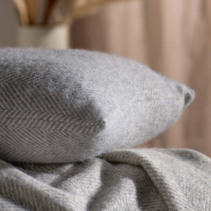 Light Grey Herringbone Pure Wool Throws & Cushions - mustard, styled in a bedroom 2 | Soak and Sleep
