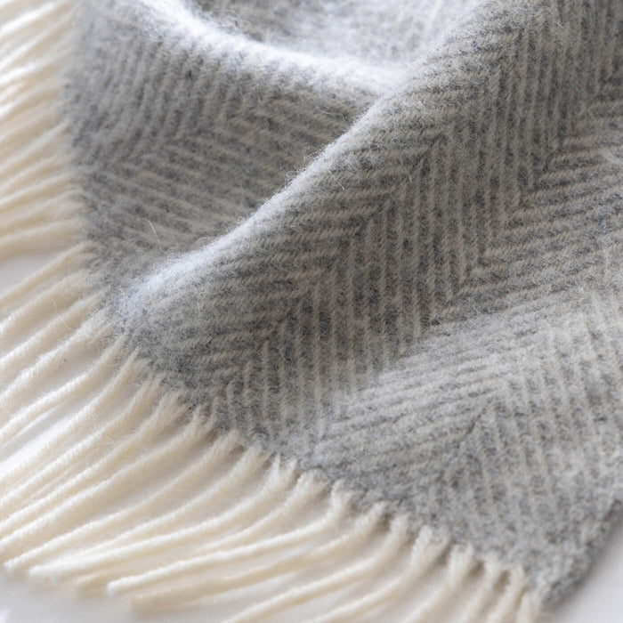 Light Grey Herringbone Pure Wool Throws & Cushions - mustard, styled in a bedroom 3 | Soak and Sleep