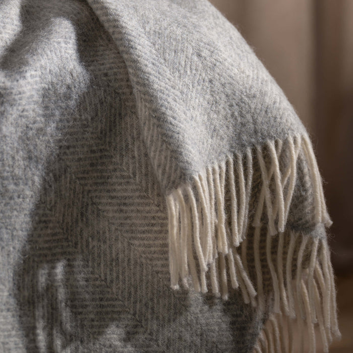 Light Grey Herringbone Pure Wool Throws & Cushions - mustard, styled in a bedroom 4 | Soak and Sleep