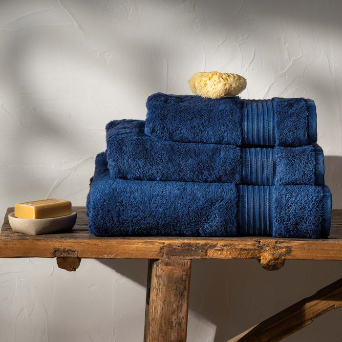 Mediterranean Blue Luxury Egyptian Cotton Bath Sheet styled in a bedroom | Soak and Sleep
