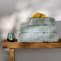 Mineral Blue Egyptian Cotton Bath Sheet styled in a bedroom | Soak and Sleep