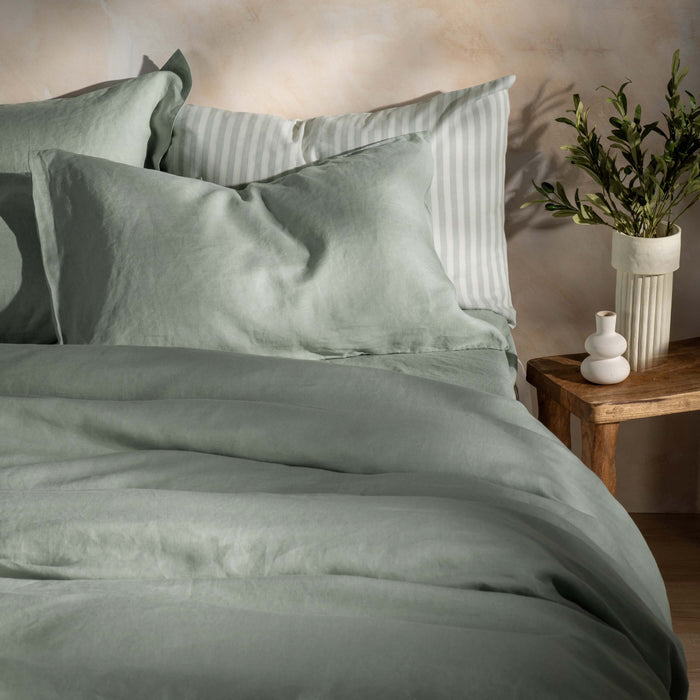 Misty Green French Linen Duvet Cover - breathable, styled in a bedroom | Soak and Sleep