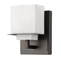 Single-light wall sconce with oil-rubbed bronze finish and square frosted glass shade