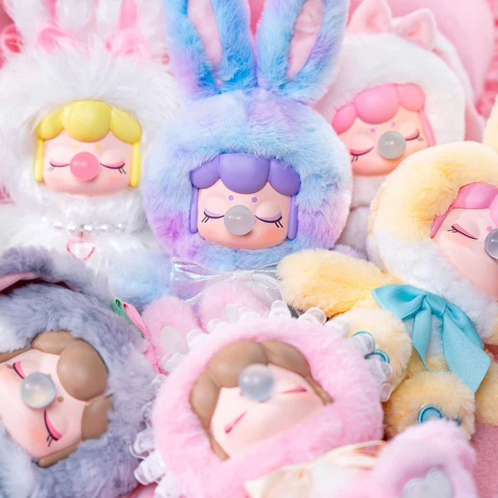 Nanci's Shining Bunny Plush Blind Box, a close-up of a pink plush toy from a random 7-character set, featuring PVC and polyester materials.