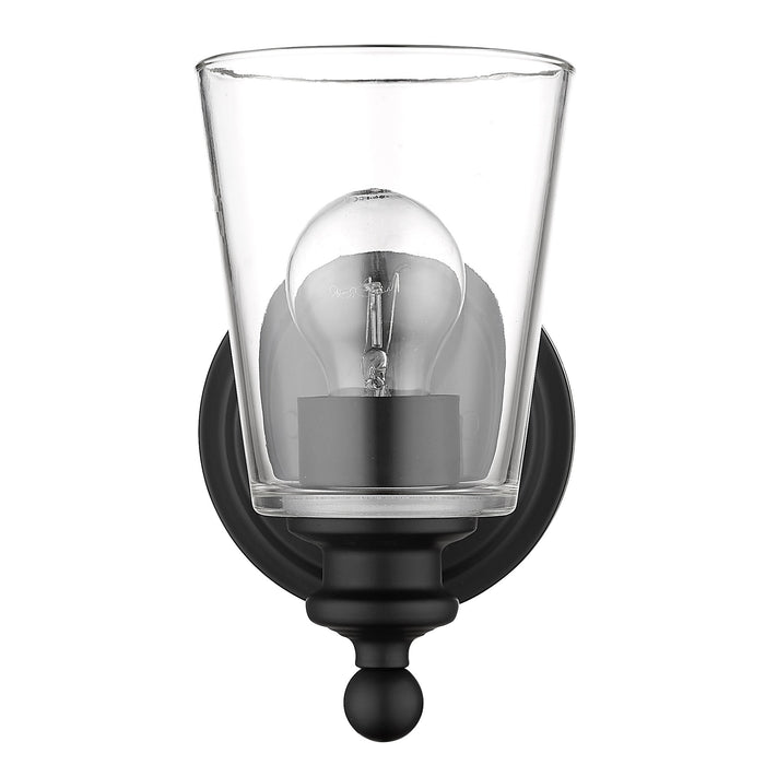 Front  view of the One-Light Matte Black Wall Sconce with clear tapered glass shade and curved arm design