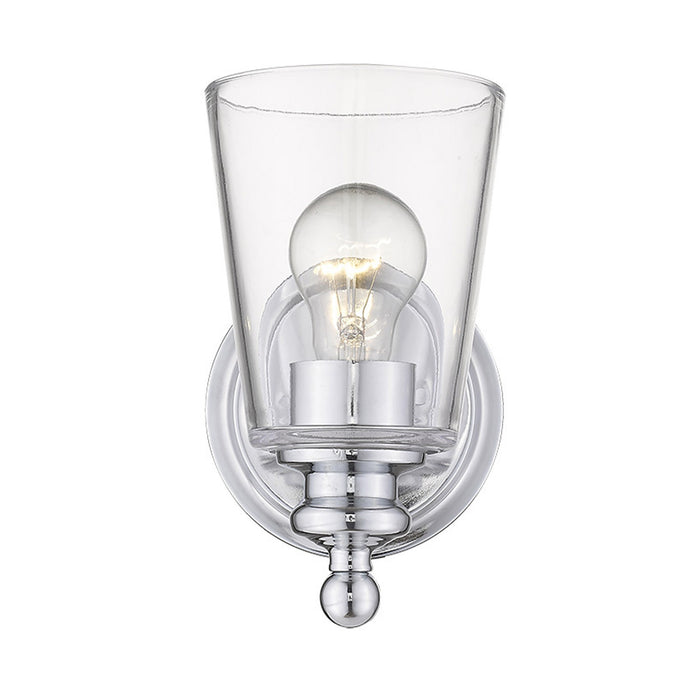 Front view of the lighted One-Light Silver Wall Sconce with clear tapered glass shade and polished chrome finish