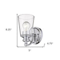 One-Light Silver Wall Sconce with clear tapered glass shade and polished chrome finish shown with dimensions of eight point two five inches high by five inches wide by six point seven five inches deep