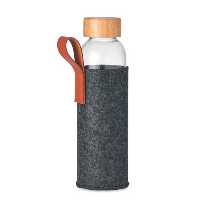 Clear glass water bottle with wooden cap and gray felt sleeve on a white background
