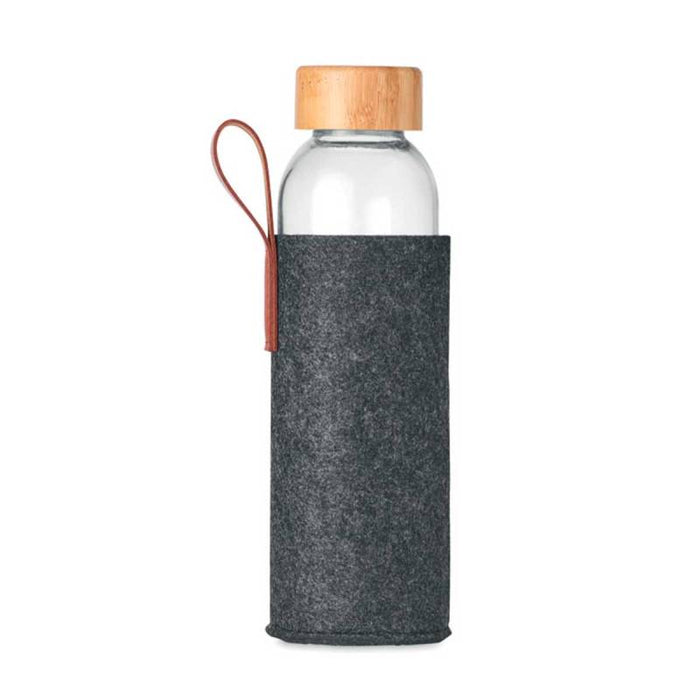Clear glass water bottle with wooden cap and dark gray felt sleeve on a white background
