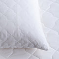 Quilted Cotton Mattress & Pillow Protector Bundles - breathable, styled in a bedroom | Soak and Sleep