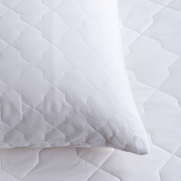 Quilted Cotton Mattress & Pillow Protector Bundles - breathable, styled in a bedroom | Soak and Sleep