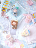 Sleepy Baby series vinyl plush keychain blind box displayed with stuffed animals, featuring preorder details for Strangecat Toys' art-inspired blind box collection.