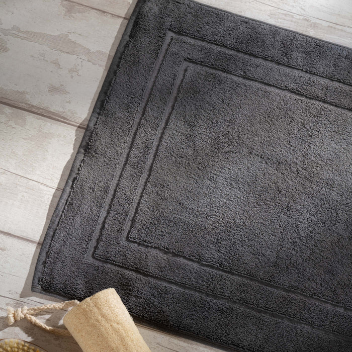 Smoke Egyptian Cotton Bath Mat styled in a bedroom | Soak and Sleep