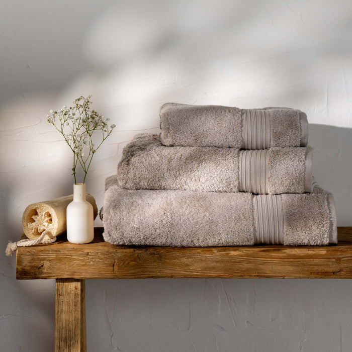 Taupe Egyptian Cotton Hand Towel styled in a bedroom | Soak and Sleep