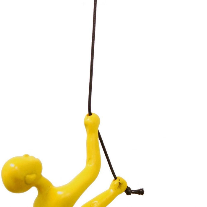 Unique Yellow Climbing Man Wall Art | 3"x6"