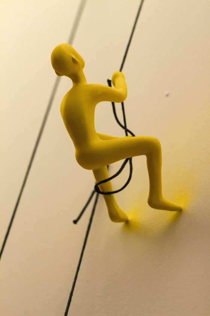 Unique Yellow Climbing Man Wall Art | 3"x6"