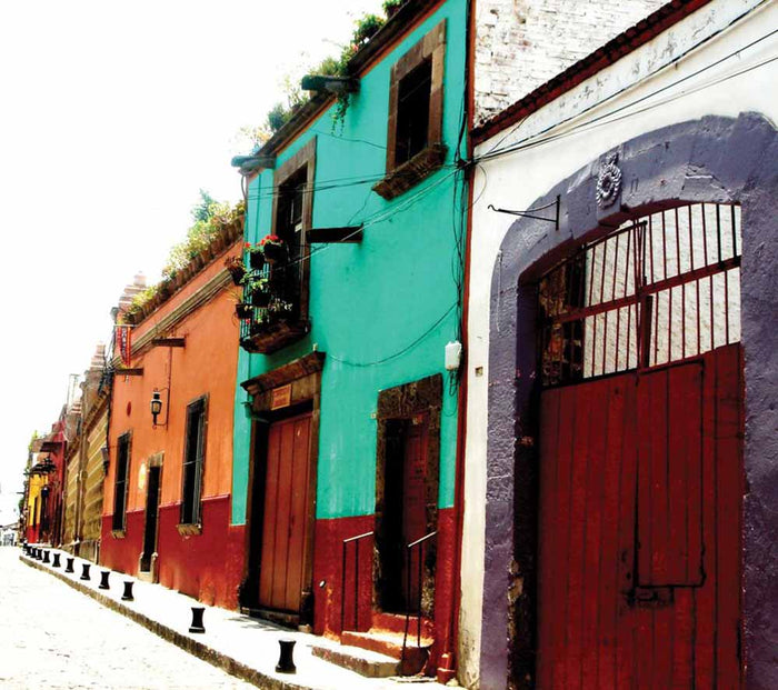 Colorful Mexican street architecture with buildings in a row wall decal printed | Wallhogs