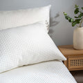 Waterproof Bamboo Mattress and Pillow Protector - temperature-regulating, styled in a bedroom | Soak and Sleep