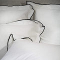 White/ Charcoal Overlocked Edge Linen & Cotton Blend Pillowcases - black, close-up detail 1 | Soak and Sleep