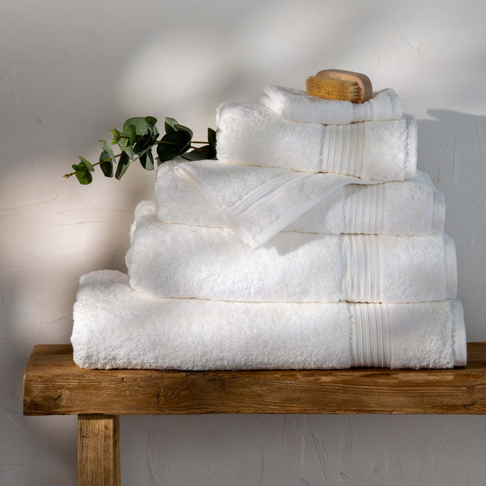 White Egyptian Cotton Hand Towel styled in a bedroom | Soak and Sleep