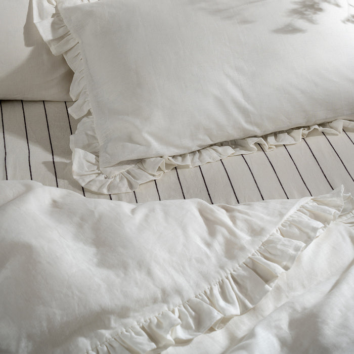 White Ruffled French Linen Bedding And Bed Sheets - temperature regulating, close-up detail 4 | Soak and Sleep
