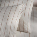 White/Burnt Orange Pinstripe Linen Cotton Pillowcases bedroom detail | Soak and Sleep