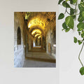 24 inch poster long, narrow corridor with arches of Roman arena in Nimes France installed on a wall