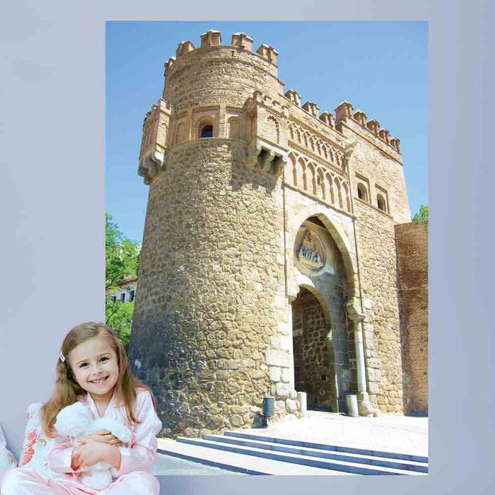 72 inch decal of Moors Arch in Toledo Spain installed on a wall with a little girl and her teddy bear in foreground