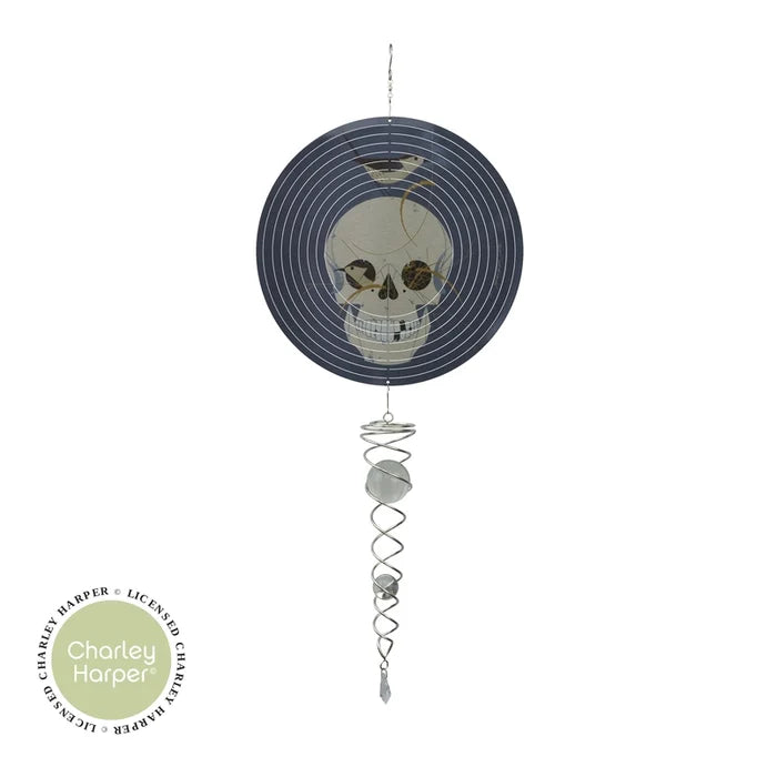 Decorative suncatcher with skull design on a white background, featuring the Charley Harper brand.