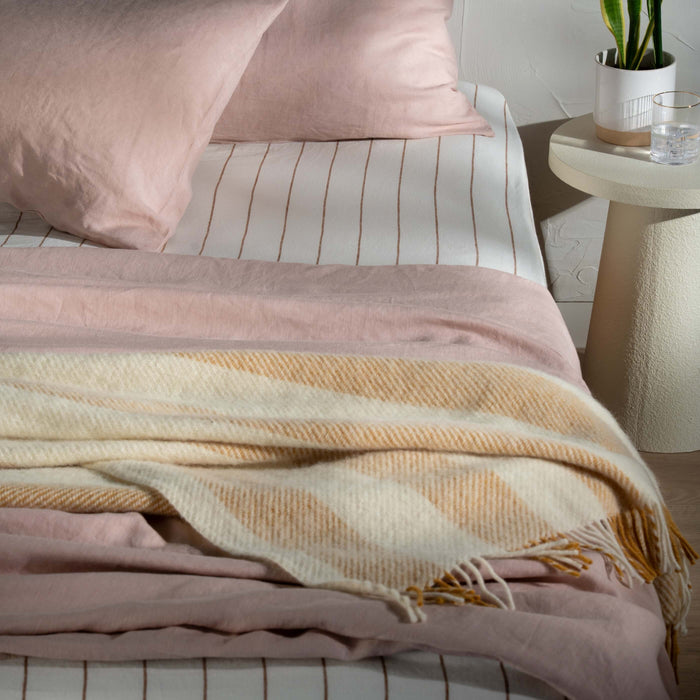 Yellow Ochre Brushed Wool Stripe Throw - breathable, styled in a bedroom | Soak and Sleep